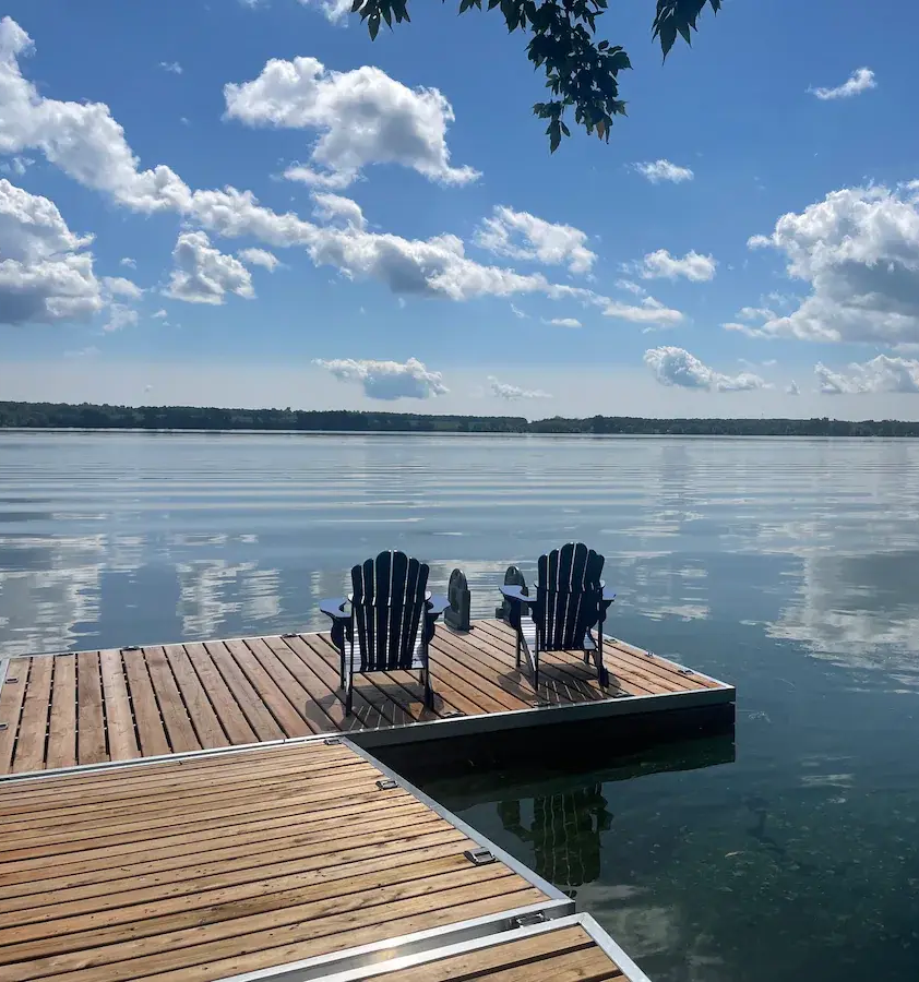 Hay Bay doc with muskoka chairs