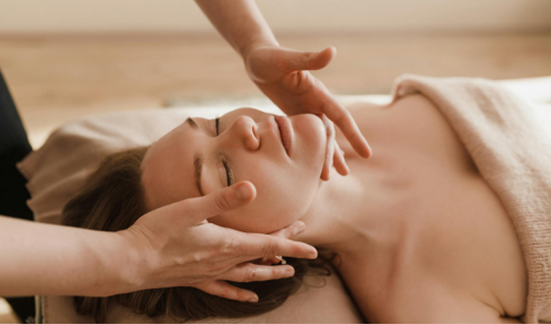 Woman getting facial massage